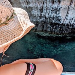 Low section of girl on rock