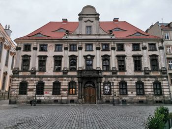 Facade of old building in city