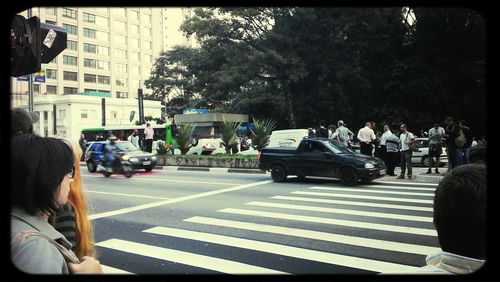 Group of people crossing road