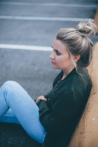 Side view of young woman