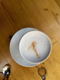 Coffee cup on wooden table
