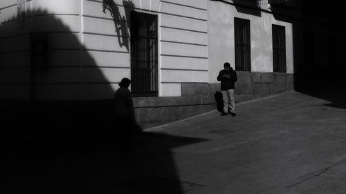 Men walking in office building