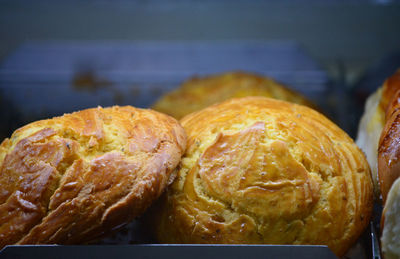 Close-up of breads on table