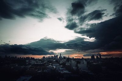 View of city against cloudy sky