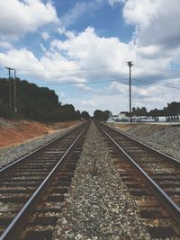 Railroad tracks against sky