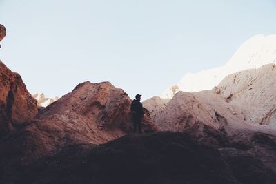 Scenic view of rocky mountains against clear sky