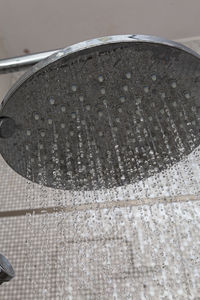 High angle view of wet glass on table