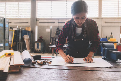 Woman working with umbrella