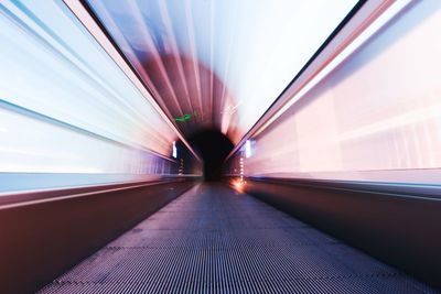 Blurred motion of illuminated tunnel