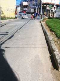 View of road along buildings