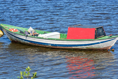 Boat moored in sea