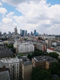 High angle view of buildings in city against sky