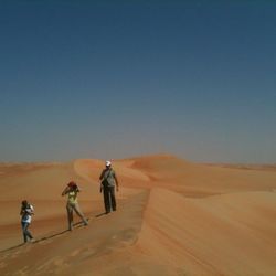 Silhouette of woman standing on landscape