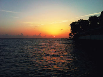 Scenic view of sunset over sea