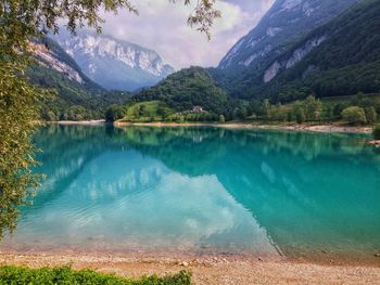 Scenic view of lake and mountains against sky