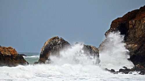 Panoramic shot of sea against clear sky