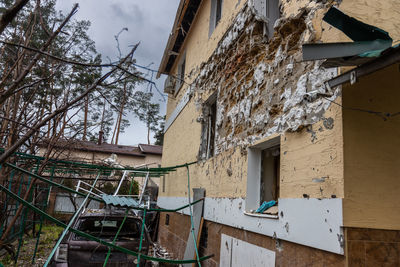 Destroyed buildings on the streets of irpen. broken windows. buildings after being hit by missiles.