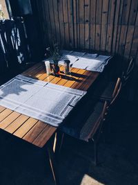 High angle view of chairs on table