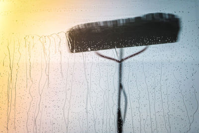 Close-up of raindrops on glass window