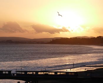 Scenic view of sea at sunset