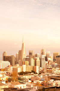 Modern buildings in city against sky