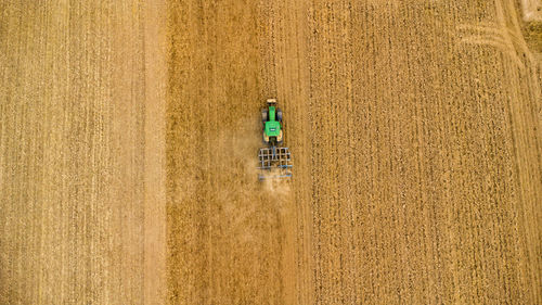 Farmer working on his tractor