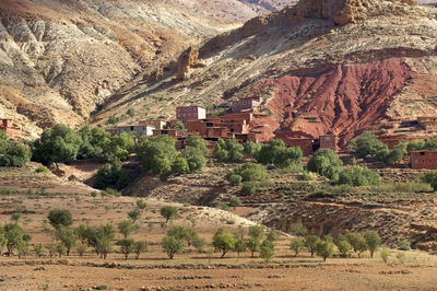 View of landscape with mountain range in background