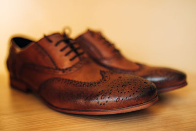 Close-up of shoes on table