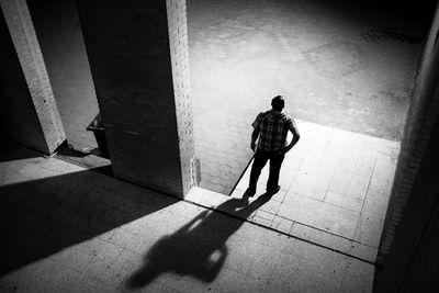 Shadow of woman on wall