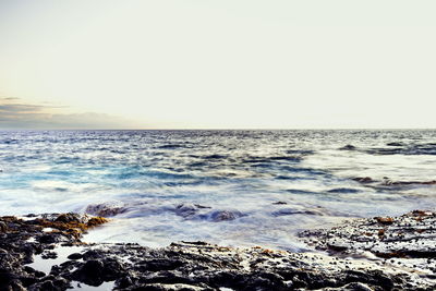 Scenic view of sea against clear sky