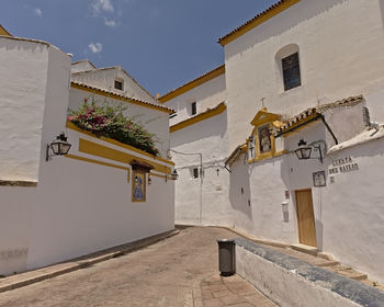 Low angle view of house against sky in city