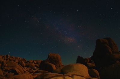 Rocks with stars in night sky