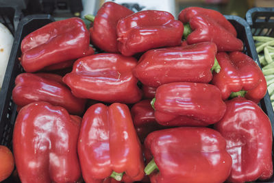 Close-up of red bell peppers for sale in market