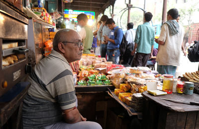 People at market stall