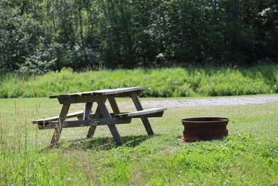 Empty bench on table in park