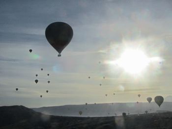 Hot air balloon over mountain