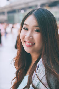 Portrait of a smiling young woman