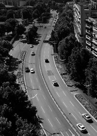 High angle view of cars on street in city