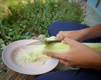 Midsection of person eating food