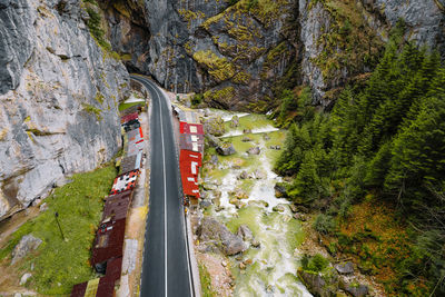 Aerial view of road and shops in mountain canyon