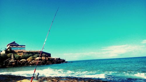 View of sea against blue sky