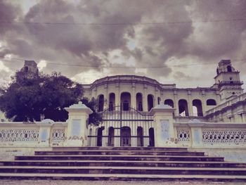 View of historical building against cloudy sky