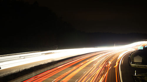 Light trails on road at night