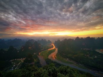 Scenic view of landscape against sky during sunset