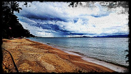 Scenic view of beach against sky