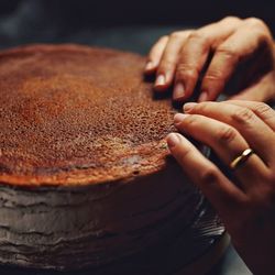 Close-up of person hand holding bread