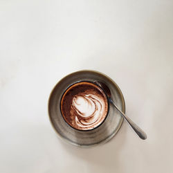 Close-up of coffee on white background