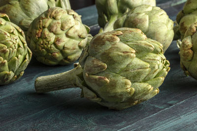 Close-up of artichoke on table