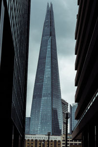 Low angle view of skyscrapers against sky