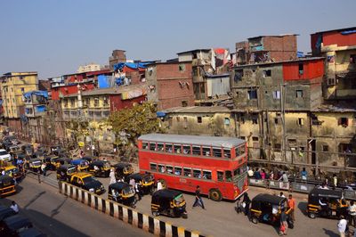 High angle view of vehicles on road in city